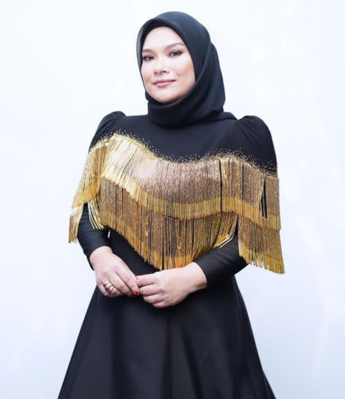 Nora Ariffin dedicated her Datukship to her late husband Johan Nawawi