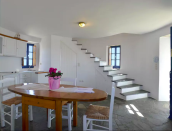 <p>The first floor of the windmill has a modern kitchen with an all-white decor. (Airbnb) </p>