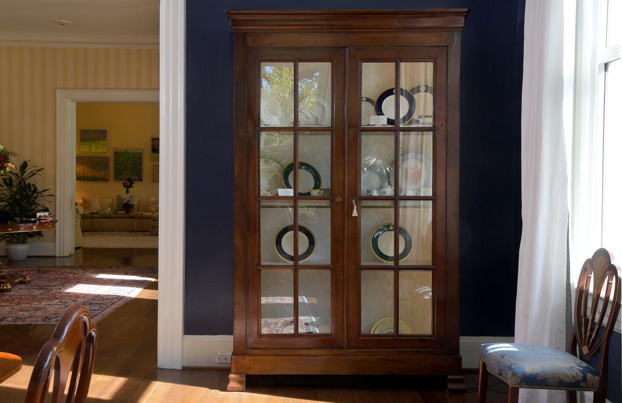 A china cabinet holds the dishes selected by vice presidents past and current. (Photo: The Washington Post via Getty Images)