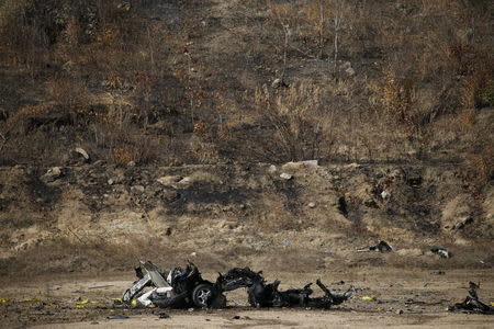 The wreckage of a vehicle that was blown up is pictured during a course on blast scene investigation near Hua Hin, Thailand January 18, 2016. REUTERS/Jorge Silva