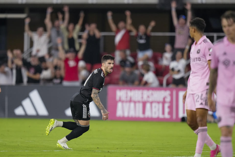 D.C. United forward Taxiarchis Fountas, left, reacts after scoring a goal during the second half of an MLS soccer match against Inter Miami, Saturday, July 8, 2023, in Washington. (AP Photo/Alex Brandon)