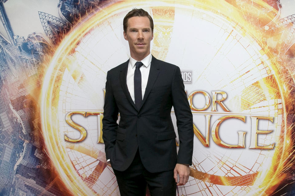 FILE - In this Oct. 24, 2016 file photo, Benedict Cumberbatch poses for photographers upon arrival at the launch event of the film "Doctor Strange" in London. Hollywood studios are shuffling more release dates as a result of the coronavirus, including “Doctor Strange 2” and the sequels to “Spider-Man: Far From Home” and “Into the Spider-Verse.” Late Friday, both Sony Pictures and The Walt Disney Co. announced updated theatrical release schedules including some significant delays to some of their marquee superhero films. “Doctor Strange in the Multiverse of Madness" will now open in 2022. (Photo by Joel Ryan/Invision/AP, File)