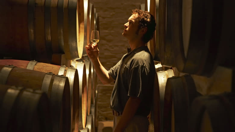 Holding wine in wine cellar