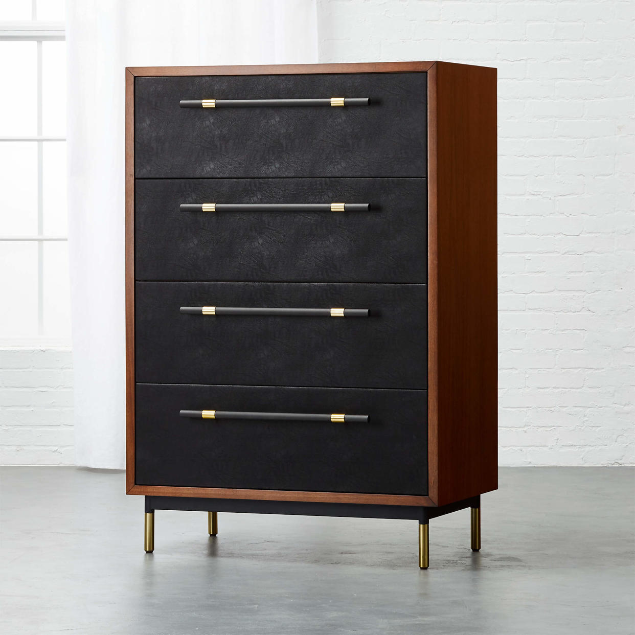 <p><a href="https://go.redirectingat.com?id=74968X1596630&url=https%3A%2F%2Fwww.cb2.com%2Foberlin-tall-4-drawer-black-leather-and-wood-dresser%2Fs537302&sref=https%3A%2F%2Fwww.esquire.com%2Flifestyle%2Fg42726005%2Fbest-dressers%2F" rel="nofollow noopener" target="_blank" data-ylk="slk:Shop Now;elm:context_link;itc:0;sec:content-canvas" class="link rapid-noclick-resp">Shop Now</a></p><p>Oberlin Tall Dresser</p><p>cb2.com</p><p>$1199.00</p>