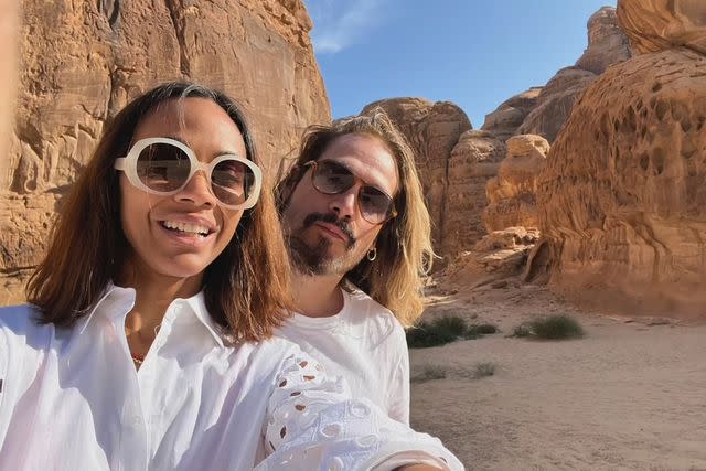 <p>Zoe Saldana /Instagram</p> Zoe Saldaña poses with husband Marco Perego in what appears to be the Grand Canyon.