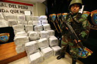 Peruvian police show to the press more than two tonnes of cocaine hidden in packages of asparagus destined for Amsterdam, and arrested a Serbian man and four Peruvians suspected of running a smuggling operation from a gourmet food business, authorities said, at police headquarters in Lima, Peru, January 12, 2017. REUTERS/Mariana Bazo