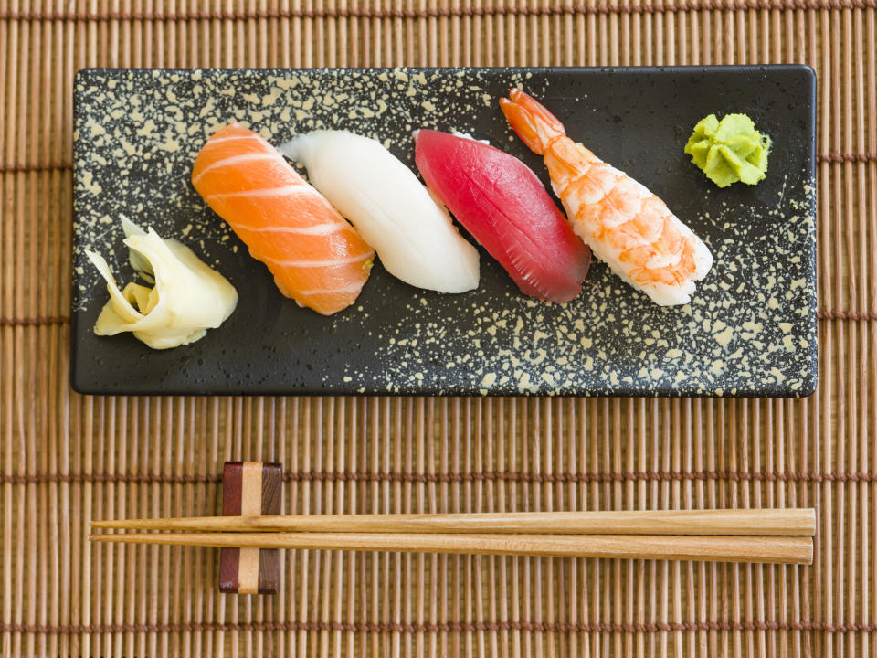 Got the sniffles? Ask for extra wasabi and ginger with your sushi. (Photo: RichLegg via Getty Images)