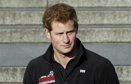 Britain's Prince Harry attends the Walking with the Wounded South Pole Allied Challenge 2013 British team departure event at Trafalgar Square in London November 14, 2013. REUTERS/Stefan Wermuth