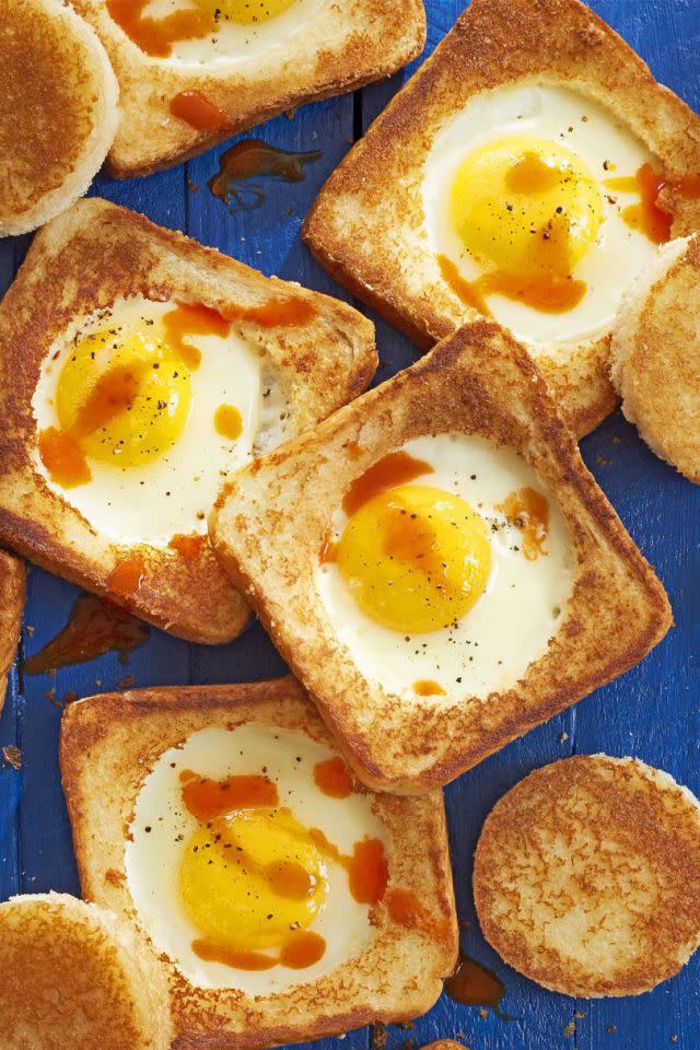 <p>If Mom has a knack for all things spicy, drizzle some hot sauce atop these egg and toast delights.</p><p><em><a href="http://www.countryliving.com/food-drinks/recipes/a41630/parmesan-egg-in-hole-recipe/" rel="nofollow noopener" target="_blank" data-ylk="slk:Get the recipe from Country Living »;elm:context_link;itc:0;sec:content-canvas" class="link ">Get the recipe from Country Living »</a></em></p>