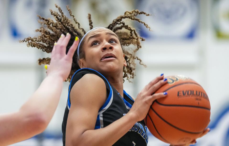 Hamilton Southeastern Royals guard Kennedy Holman (11) searches to shoot the ball Saturday, Feb. 3, 2024, during the IHSAA girls basketball sectional Class 4A game at Hamilton Southeastern High School in Indianapolis. The Noblesville Millers defeated the Hamilton Southeastern Royals, 49-45.