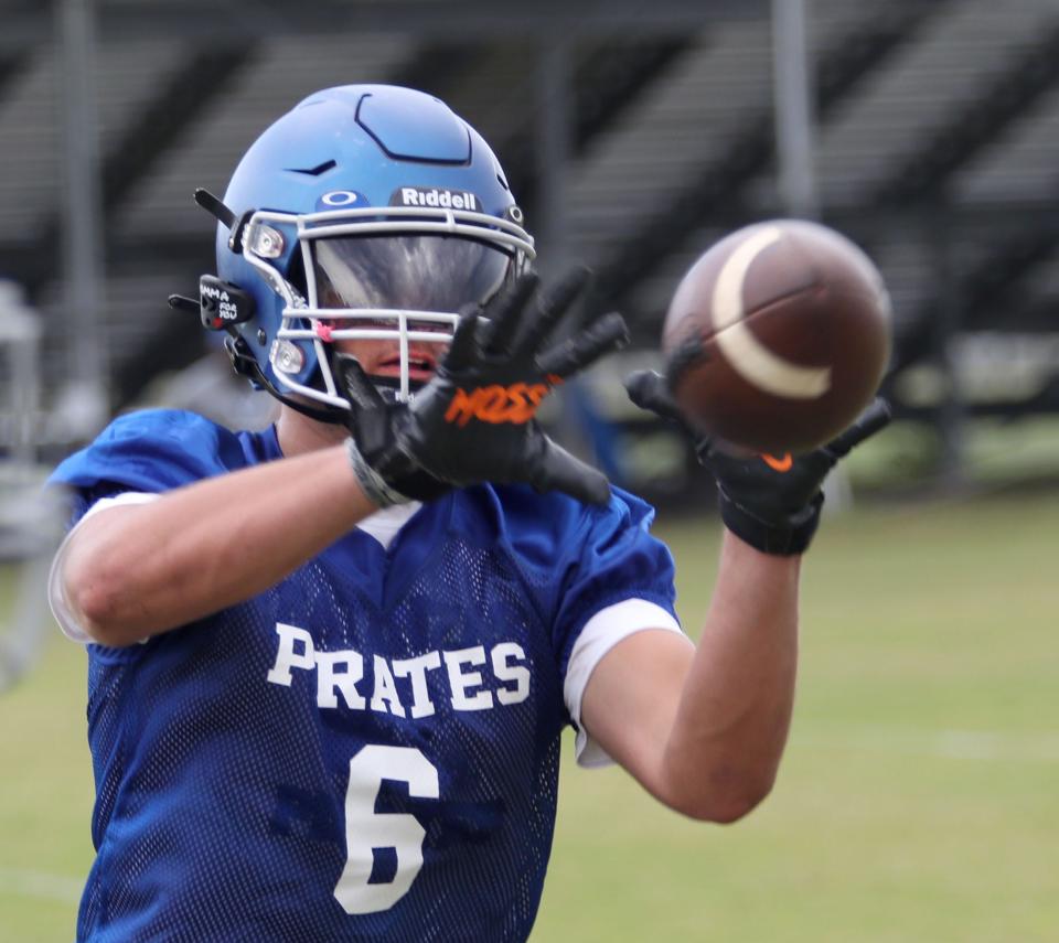 Matanzas' Daniel DeFalco (6) hauls in a pass during spring practice, Tuesday, April, 25, 2023.