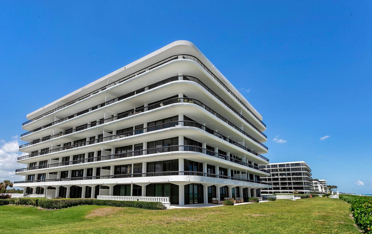 Surrounded by a hedge, condo No. 105's garden area can be seen at the far left. The south building is one of three oceanfront buildings at Beach Point.