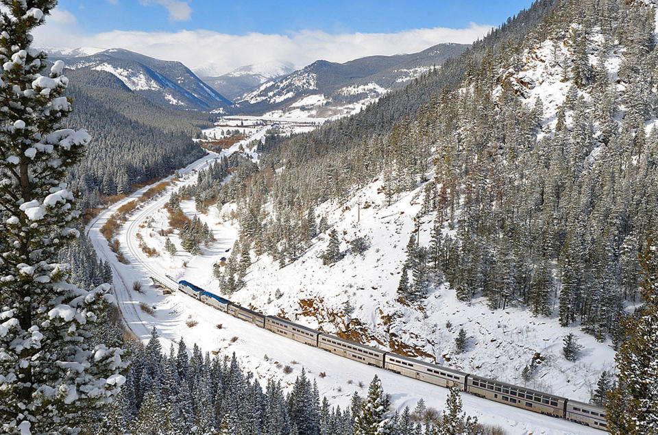 This undated image provided by Amtrak shows the California Zephyr train on a snowy route passing through Rocklin, Calif. The Zephyr’s journey from its starting point, Emeryville, Calif., to Reno, Nev., is a 236-mile route that offers beautiful views as well as history. It crosses the Sierra Nevada mountain range and follows the same course as the historic Transcontinental Railroad, a 19th century engineering feat that bolstered the nation’s western expansion. The Zephyr’s ultimate destination is Chicago, a 51-hour trip from Emeryville. (AP Photo/Amtrak, Phil Gosney)