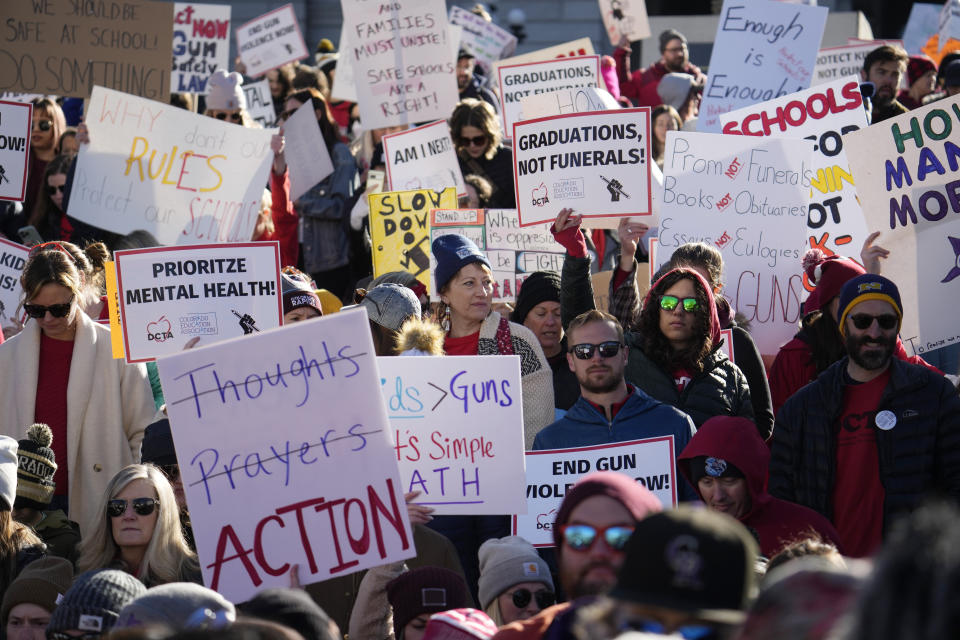 Students and parents from schools across Colorado take part in a rally calling for state lawmakers to consider gun control measures during the current legislative session Friday, March 24, 2023, outside the State Capitol in Denver. (AP Photo/David Zalubowski)