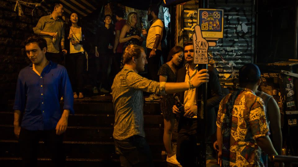 People stand and drink in Lan Kwai Fong in 2017, back when the place was still pumping. - Billy H.C. Kwok/Getty Images