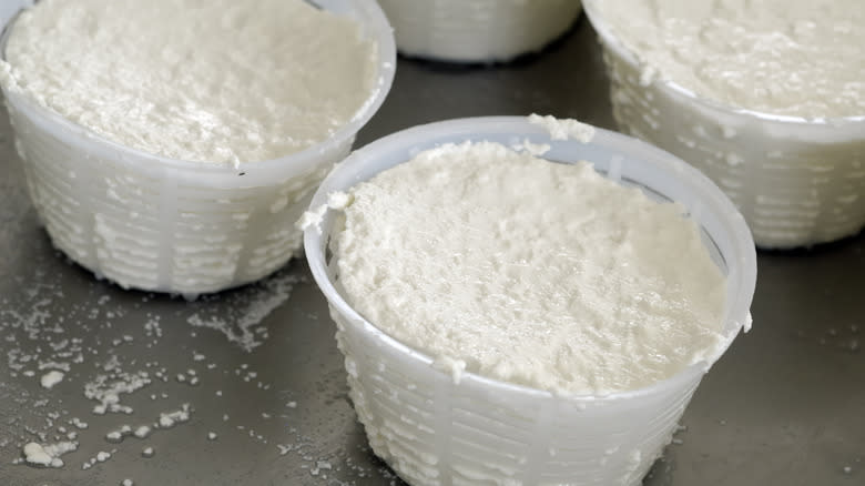Ricotta cheese in containers