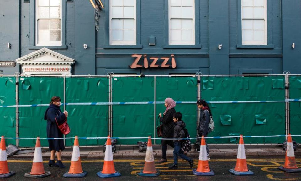 People walk past the Zizzi restaurant where Sergei Skripal and his daughter Yulia ate on the day they were poisoned. 