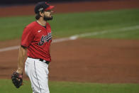 Cleveland Indians relief pitcher Brad Hand waits before being removed during the ninth inning of Game 2 of the team's American League wild-card baseball series against the New York Yankees, early Thursday, Oct. 1, 2020, in Cleveland. The Yankees won 10-9. (AP Photo/David Dermer)