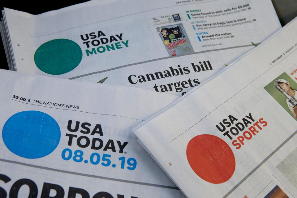 Sections of a USA TODAY newspapers.