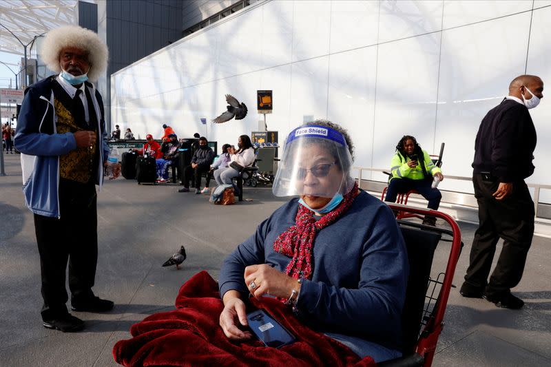 Ilene Robinson, 79, waits for her ride after traveling from Detroit to Hartsfield–Jackson Atlanta International Airport ahead of the Thanksgiving holiday