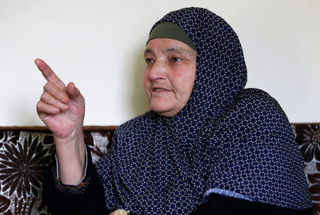 Kamleh Daqamseh, mother of Ahmad Daqamseh, the Jordanian soldier convicted of killing seven Israeli schoolgirls on March 13, 1997, speaks to the media after the release of her son from prison, at her home in the village of Ibdir, Jordan March 12, 2017. REUTERS/Muhammad Hamed