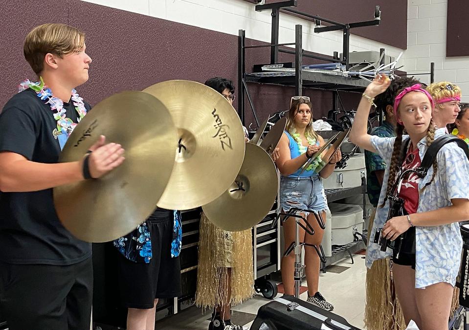 Members of Sturgis High School's marching band rehearsed the national anthem Monday at band camp.