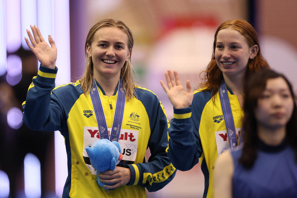 FUKUOKA, JAPAN - JULY 26:  Silver medallist Ariarne Titmus of Team Australia and gold medallist Mollie O'Callaghan of Team Australia react during the medal ceremony for the Women's 200m Freestyle Final on day four of the Fukuoka 2023 World Aquatics Championships at Marine Messe Fukuoka Hall A on July 26, 2023 in Fukuoka, Japan. (Photo by Adam Pretty/Getty Images)