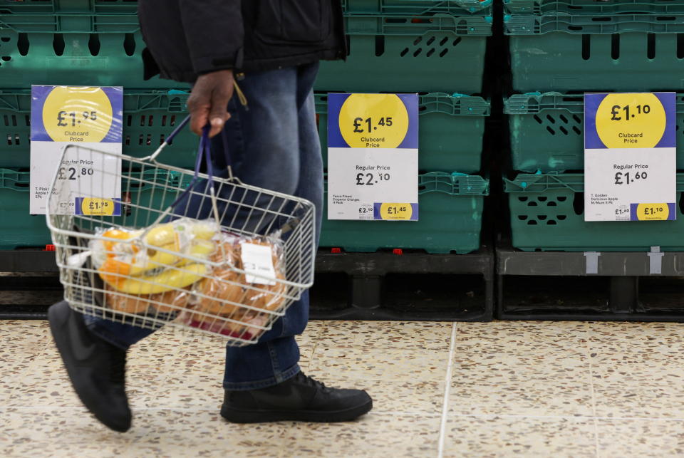 Clubcard branding is seen inside a branch of a Tesco Extra Supermarket in London, Britain, February 10, 2022. Picture taken February 10, 2022. REUTERS/Paul Childs