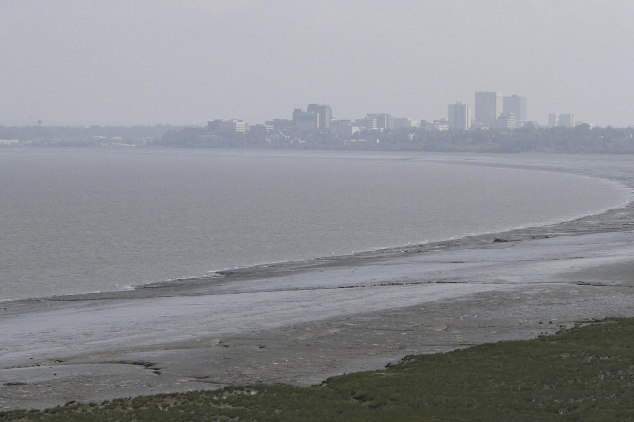 Wildfires burning hundreds of miles away create smoky conditions Monday, June 13, 2022, in Anchorage, Alaska. (Mark Thiessen/AP)