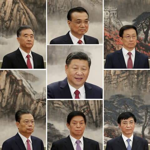 A combination of pictures showing China's new Politburo Standing Committee members  - Credit:  JASON LEE/Reuters 