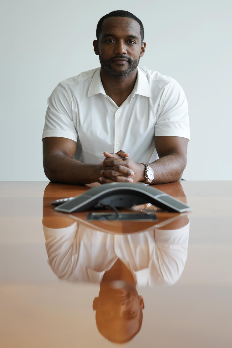 Adrian Perkins, former mayor of Shreveport, La., sits for a portrait in his office in Chicago, Thursday, June 13, 2024. “One hundred percent the deepfake ad affected our campaign because we were a down-ballot, less resourced place,” said Perkins, a Democrat. “You had to pick and choose where you put your efforts.” (AP Photo/Nam Y. Huh)