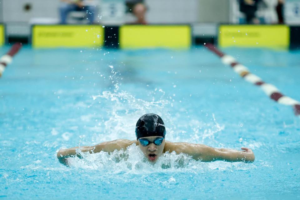 Bishop McGuiness’ John Nguyen swims in the Boys 200 Yard IM during the 5A State Championship swim meet in Jenks, Okla., on Friday, Feb. 16, 2024.