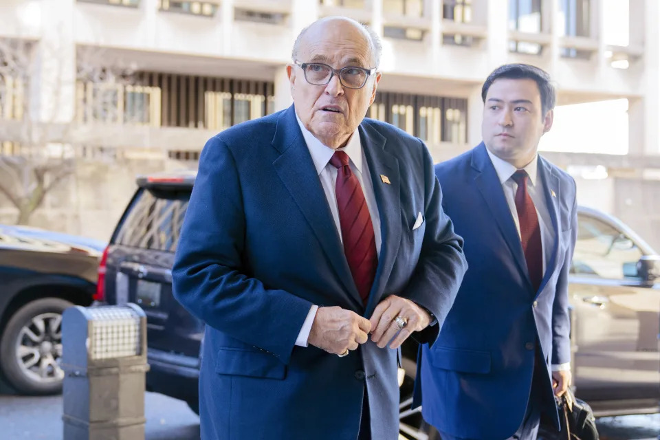 FILE - Former Mayor of New York Rudy Giuliani arrives at the federal courthouse in Washington, Dec. 11, 2023. Giuliani filed a last-minute deal Wednesday, July 31, 2024, to end his personal bankruptcy case and pay about $400,000 to a financial adviser hired by his creditors. (AP Photo/Jose Luis Magana, File)