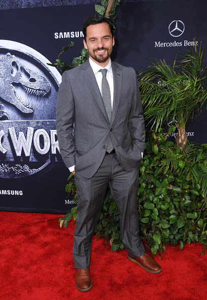 Jake Johnson might play the lovable smart but stupid Nick Miller on “New Girl,” but in “Jurassic World” he’s a scientist fully living up to his potential. The actor looked ecstatic (and adorable, excuse me, adorkable) at the movie’s premiere in a gray suit and matching tie.