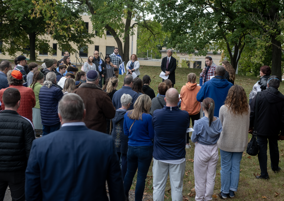 Andrew Aronoff and Rose Martyn, co-presidents of the Hillel student board leadership, speak near the end of the Kent State Uniting for Israel gathering Thursday at Hillel.