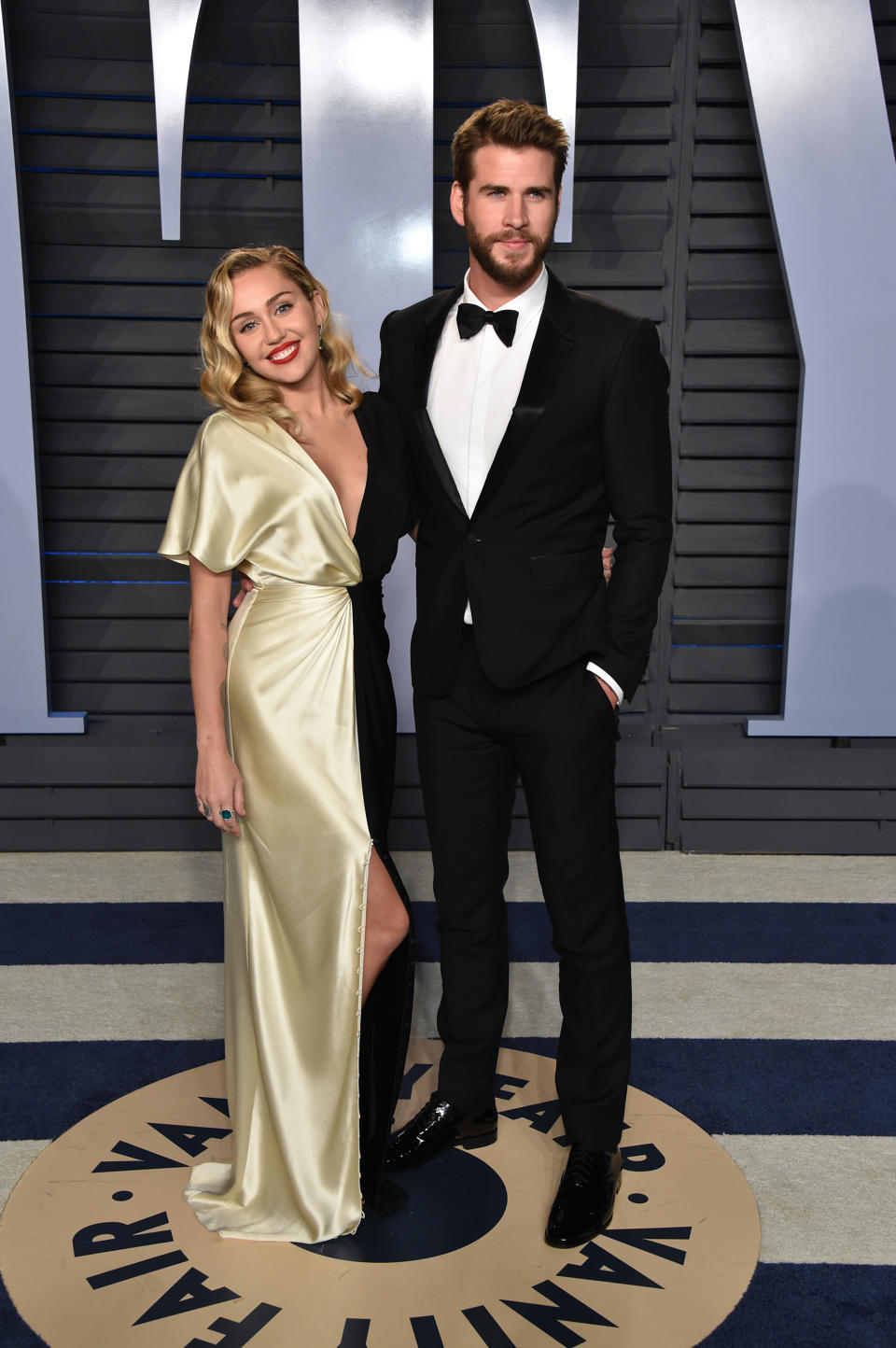 Miley Cyrus and fiancé Liam Hemsworth attend the <em>Vanity Fair</em> — yup, <em>Vanity Fair</em> — Oscar viewing party on March 4, 2018. (Photo: Axelle/Bauer-Griffin/FilmMagic)