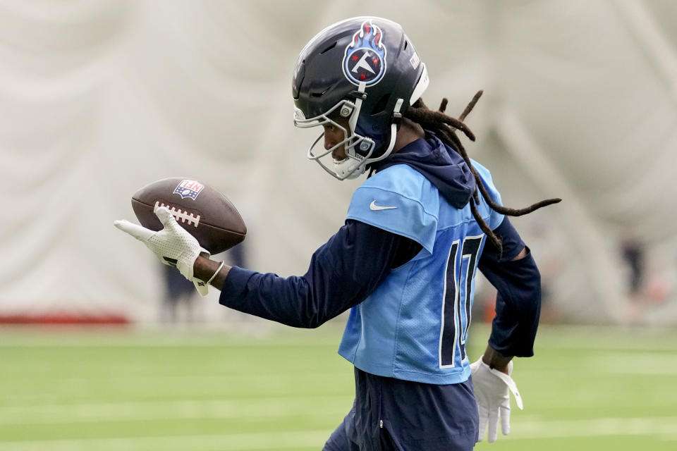 Tennessee Titans wide receiver DeAndre Hopkins makes a catch during NFL football practice Tuesday, June 4, 2024, in Nashville, Tenn. (AP Photo/George Walker IV)