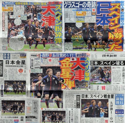 Some of the front pages of Tokyo's morning papers are seen here on July 27, reporting on Japan's winning football match against Spain in the group D, London 2012 Olympic Games. Japanese football fans basked in dreamy euphoria as they woke to the news that its Blue Samurai had sunk reigning world and European champions Spain 1-0