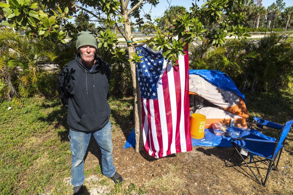 Mike Bartholomei, a homeless veteran, shown earlier this year by his tent in John Prince Park west of Lake Worth Beach. He said he once served in the Navy at Pearl Harbor.