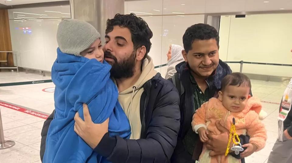 Khalid El-Estal, His Four Year Old Son Ali And One Year Old Daughter Sara In Dublin Airport With Their Uncle Mohammed Jendia