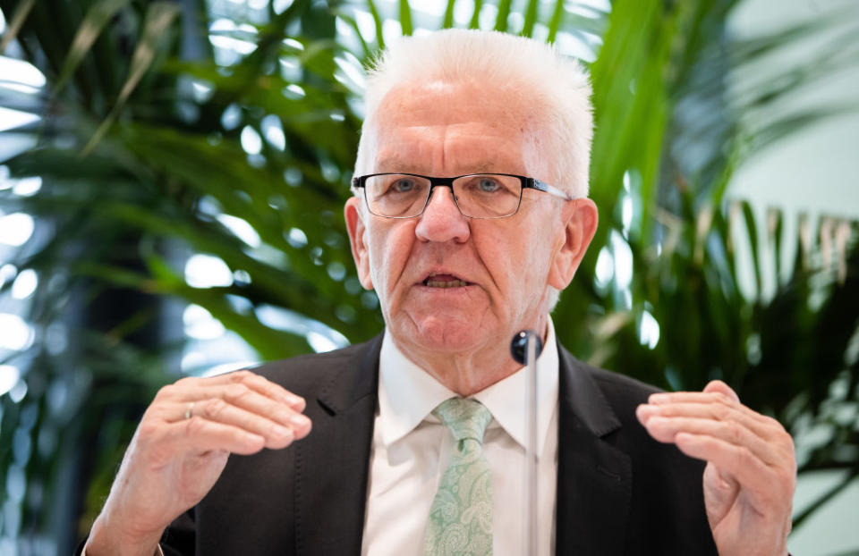 01 October 2020, Baden-Wuerttemberg, TÃ¼bingen: Winfried Kretschmann (BÃ¼ndnis 90/Die GrÃ¼nen), Minister President of Baden-WÃ¼rttemberg, speaking to media representatives at a press conference in a room at the biopharmaceutical company Curevac. During his visit to the company, Kretschmann informed himself about the current situation regarding a potential coronavirus vaccine. Photo: Christoph Schmidt/dpa (Photo by Christoph Schmidt/picture alliance via Getty Images)