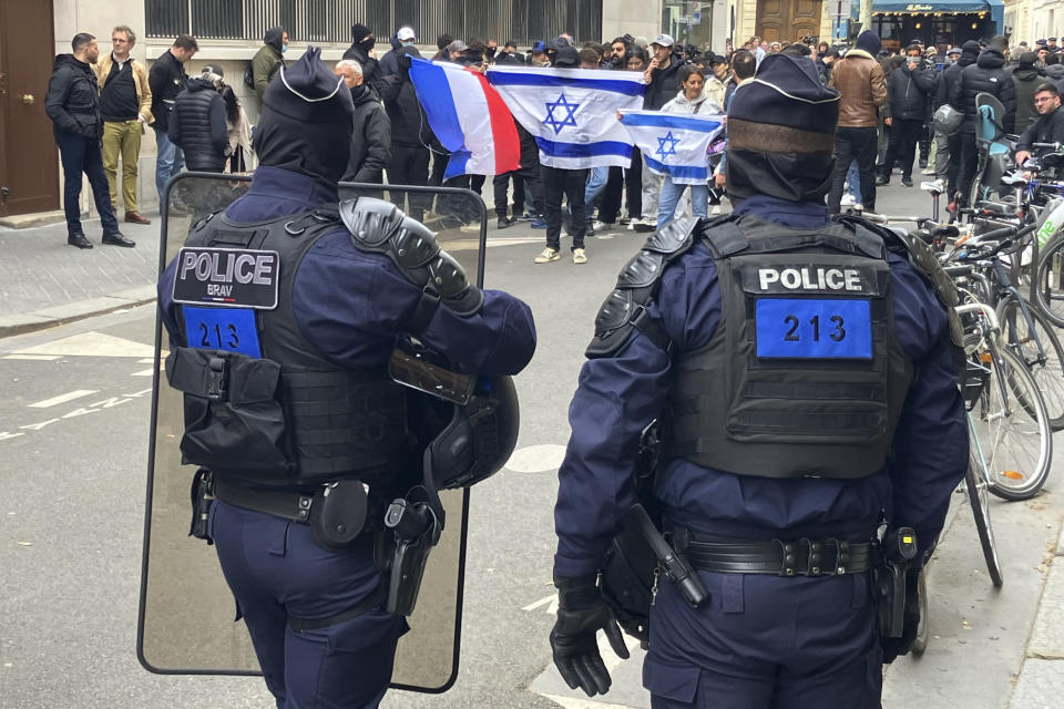 Members of the Jewish community in France demonstrate near the Sciences-Po university Friday, April 26, 2024 in Paris. Students in Paris inspired by Gaza solidarity encampments at campuses in the United States blocked access to a campus building at a prestigious French university Friday, prompting administrators to move all classes online. The pro-Palestinian protest at the Paris Institute of Political Studies, known as Sciences Po, came two days after police broke up a separate demonstration at one of the university's amphitheaters. (AP Photo/Jeffrey Schaeffer)