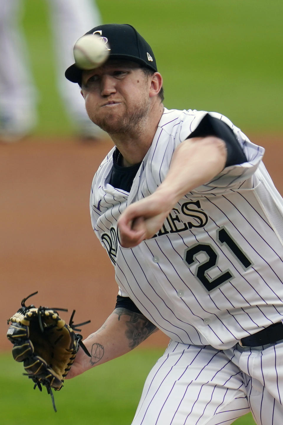 Colorado Rockies starting pitcher Kyle Freeland throws against the San Francisco Giants during the first inning of a baseball game, Thursday, Aug. 6, 2020, in Denver. (AP Photo/Jack Dempsey)