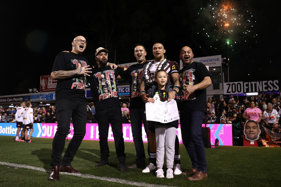 PENRITH, AUSTRALIA - SEPTEMBER 07:  James Fisher-Harris of the Panthers poses with family and friends after the round 27 NRL match between Penrith Panthers and Gold Coast Titans at BlueBet Stadium on September 07, 2024, in Penrith, Australia. (Photo by Matt Blyth/Getty Images)