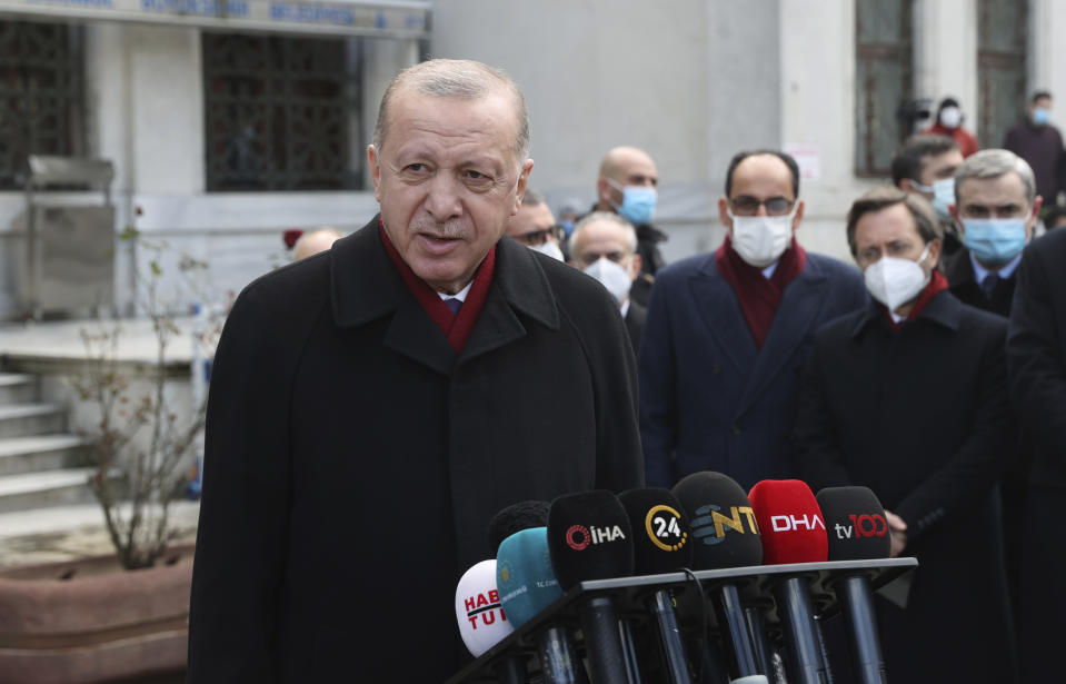 Turkey's President Recep Tayyip Erdogan speaks to the media after Friday prayers, in Istanbul, Friday, Jan. 15, 2021. Turkey’s president has criticized the United States for kicking his country out of the F-35 fighter jet program after Ankara purchased a Russian missile defense system. Speaking after Friday prayers in Istanbul, Turkish President Recep Tayyip Erdogan said Turkey paid “very serious money” for the F-35 stealth jets and that America had committed “a very serious mistake” with its NATO ally. (Turkish Presidency via AP, Pool)