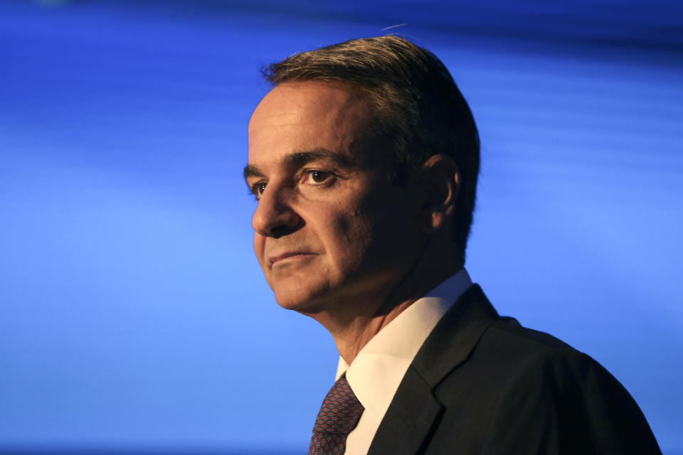 Greece's Prime Minister Kyriakos Mitsotakis pauses during a news conference at the Thessaloniki International Fair, at the northern city of Thessaloniki, Sunday, Sept. 8, 2019. Greece's prime minister said on Saturday that financial reforms such as reducing taxes, fighting bureaucracy and attracting investment must be implemented before the country asks its creditors to agree to lower budget surpluses. (AP Photo/Giannis Papanikos)