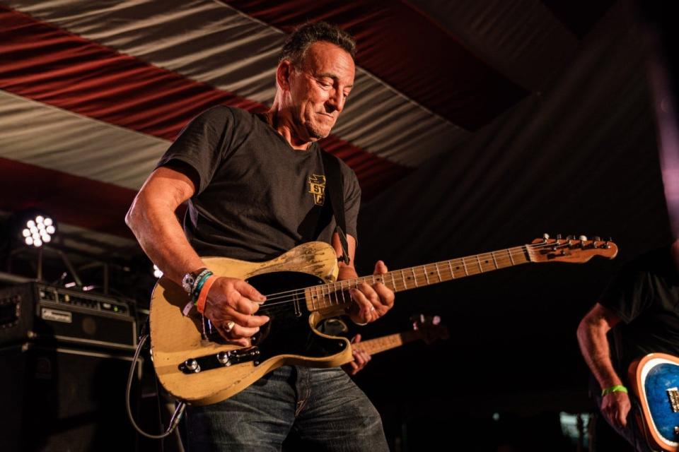Bruce Springsteen joins Joe Grushecky and the Houserockers on stage at the opening party for the Springsteen: His Hometown at the Monmouth County Historical Society in Freehold in 2019.