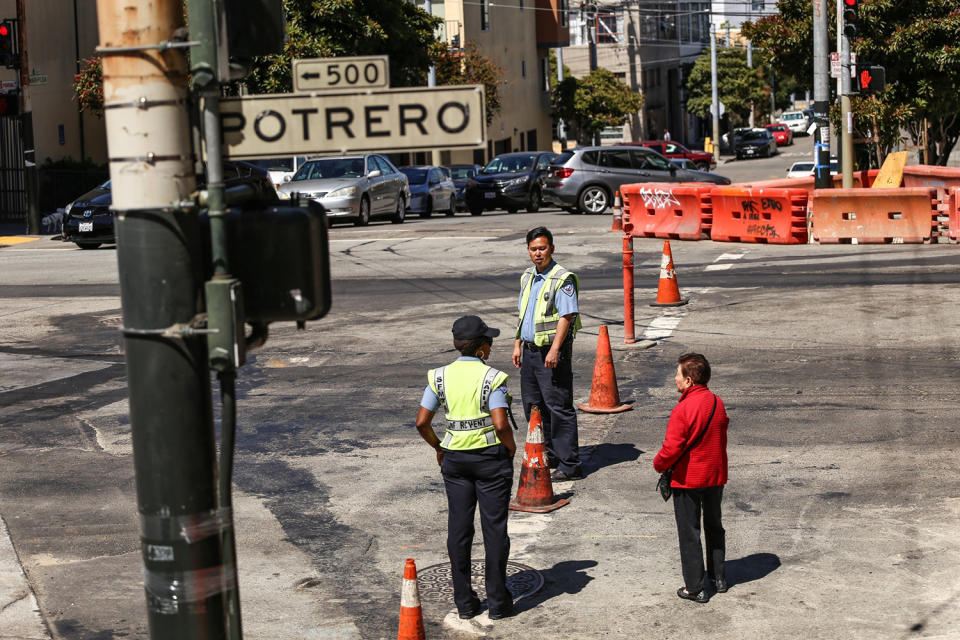 <p>Police officers stand guard at the scene of a shooting at a UPS facility on June 14, 2017 in San Francisco, California. (Joel Angel Juarez/Anadolu Agency/Getty Images) </p>