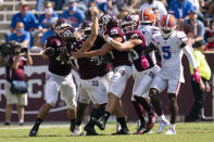 Texas A&M place kicker Seth Small (47) reacts with teammates after making the game winning field goal against Florida as time expired of an NCAA college football game, Saturday, Oct. 10, 2020. in College Station, Texas. (AP Photo/Sam Craft)