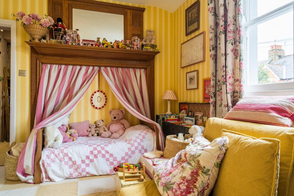 Dolly’s bedroom: wallpaper from Farrow & Ball; curtain fabric by Buchanan Studio; Bed canopy in Cabbages & Roses three-inch stripe
